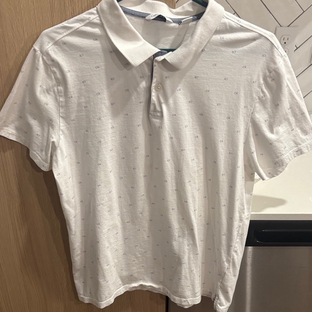 Calvin Klein White Polo with Subtle Logo Design